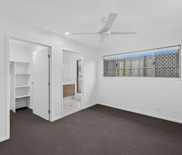 Brand New 4-Bedroom Home | Ducted Air, Solar & Multiple Living Areas - Photo 6