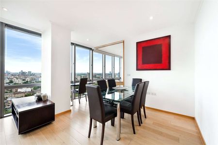 A smart two bedroom two bathroom apartment on the 24th floor of this exclusive residential development. The apartment benefits from wonderful views, 24 hour concierge, air conditioning. - Photo 2