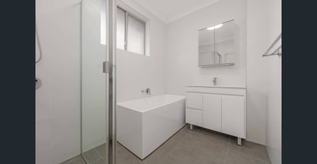 Modern Three Bedroom Apartment Offering Comfort & Convenience - Photo 5