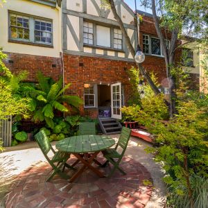Timeless Art Deco Charm with Generous Indoor–Outdoor Living - Photo 3