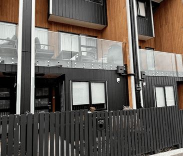 Modern Three-Bedroom Townhouse - Photo 1