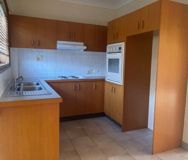 Top-Floor Spacious 2-Bedroom Unit in Prime East Corrimal Location! - Photo 5