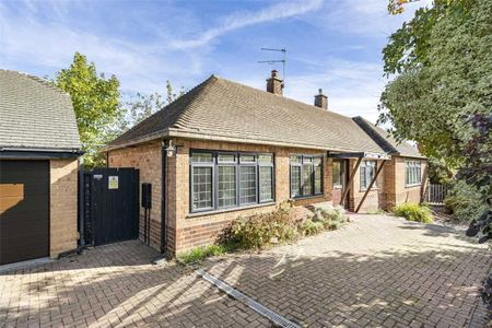 A three bedroom detached bungalow situated within the Village of Burton Green. - Photo 3