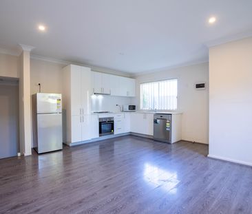All Hard Floors And Onsite Parking - Photo 2