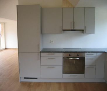 Wunderschöne 2,5 Zimmer Dachwohnung mit Balkon und Aussicht - Foto 1