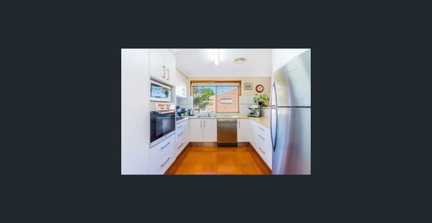 Spacious Riverside Unit in Well-Maintained Complex - Photo 1