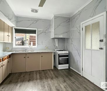 THREE-BEDROOM HOME WITH GARAGE - Photo 3