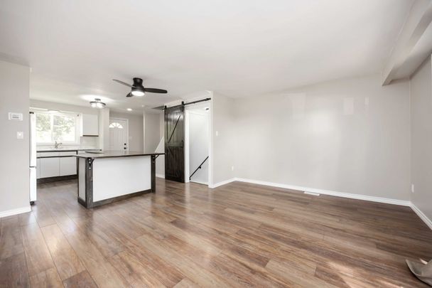 Bright &amp; Updated 3 Bedroom Townhouse with Basement and Private Outdoor Space - Photo 1
