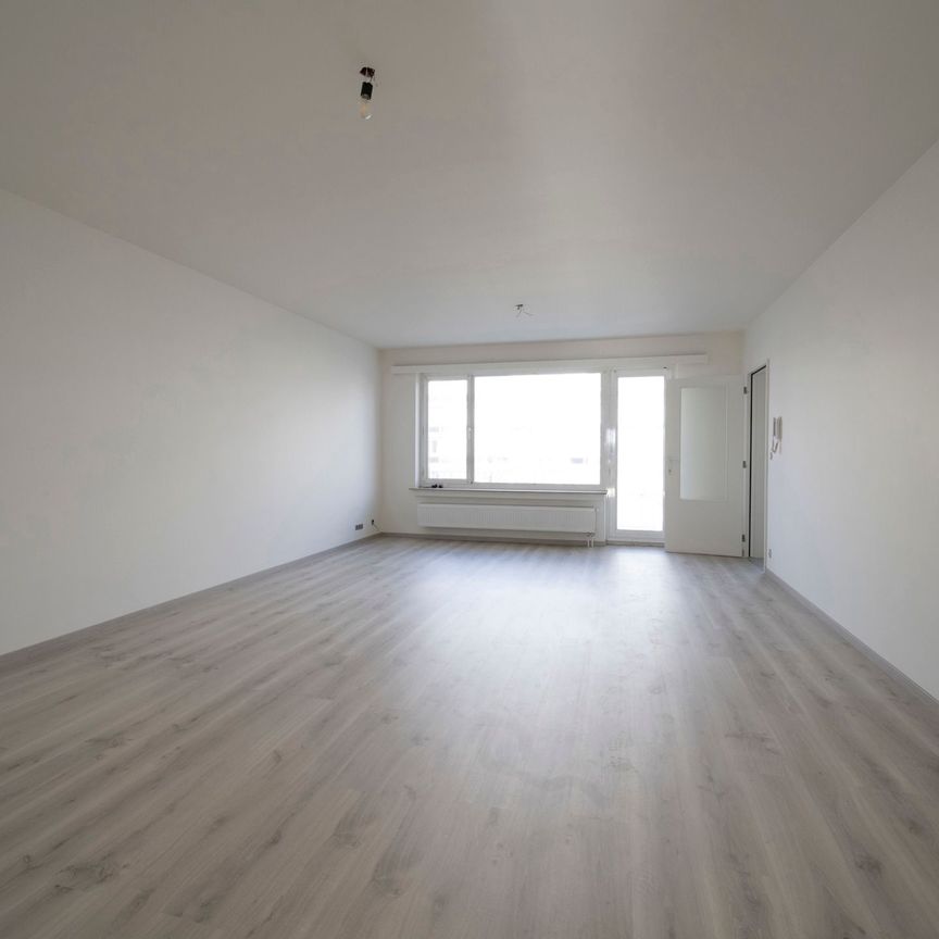 Gerenoveerd appartement met garagebox. - Photo 1