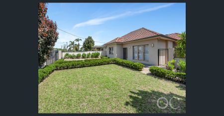 Open the Door to Style, Security, and Location in Woodville South - Photo 2