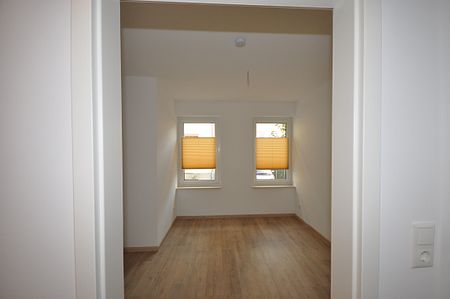 Moderne 3-Zimmer-Wohnung im Bungalow-Stil mit Parkplatz - Photo 3