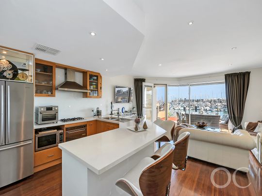 Open the Door to Waterfront Luxury and Marina Views - Photo 1