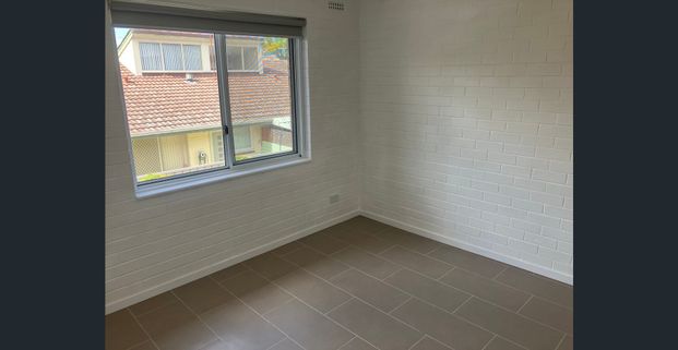 Renovated Unit Available! - Photo 1