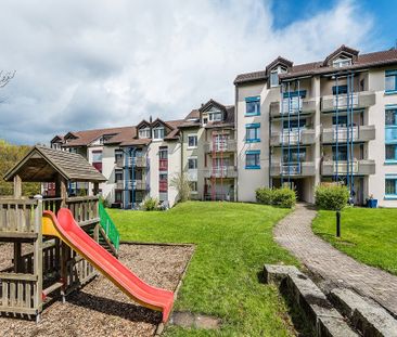 Maisonette-Dachwohnung mit Terrasse im Westen der Stadt - Photo 1