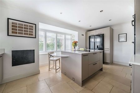 An immaculately presented four-bedroom detached family home with garaging. - Photo 5