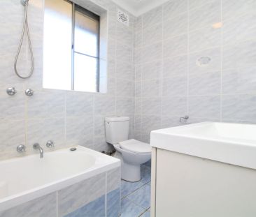 WELL-VALUED TWO-BEDROOM APARTMENT! - Photo 3