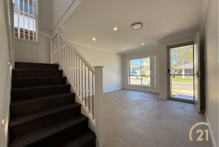 Brand New 4 Bedroom Home, Located in Austral! - Photo 4