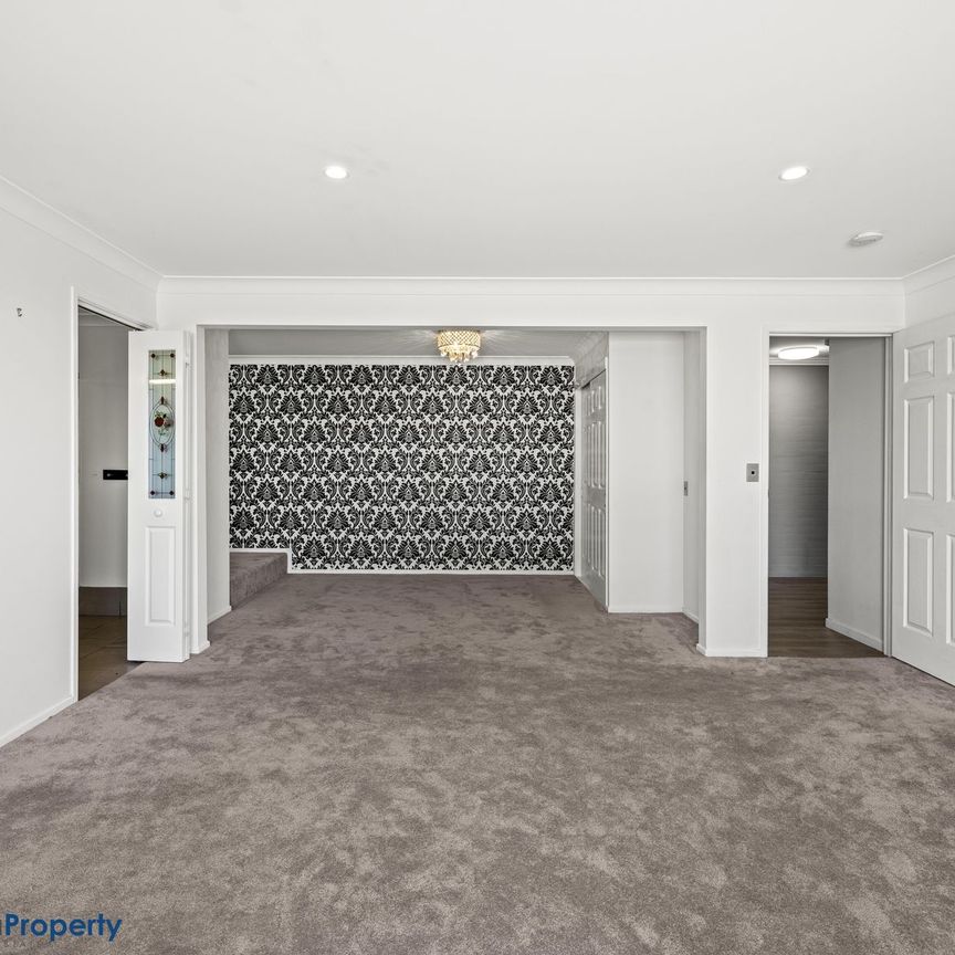 Elevate Your Lifestyle: Stunning Rangeville Home with Panoramic Views and Resort-Style Pool - Photo 1