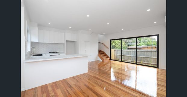 Stunning Modern Townhouse with Premium Features - Photo 1