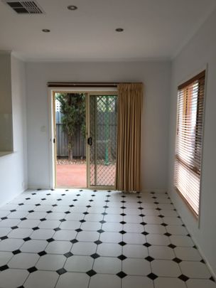 Neat Three Bedroom Courtyard - Photo 1