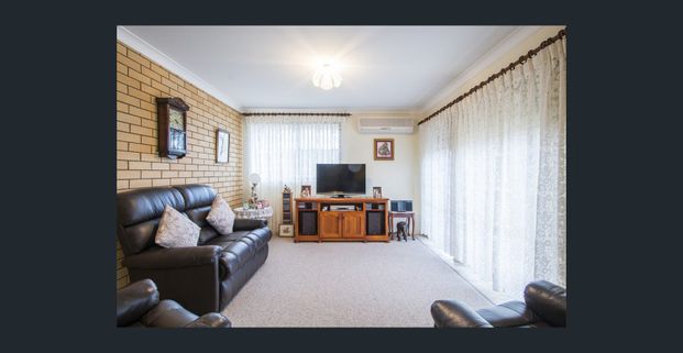 CHARMING UNIT CLOSE TO EVERYTHING - Photo 1