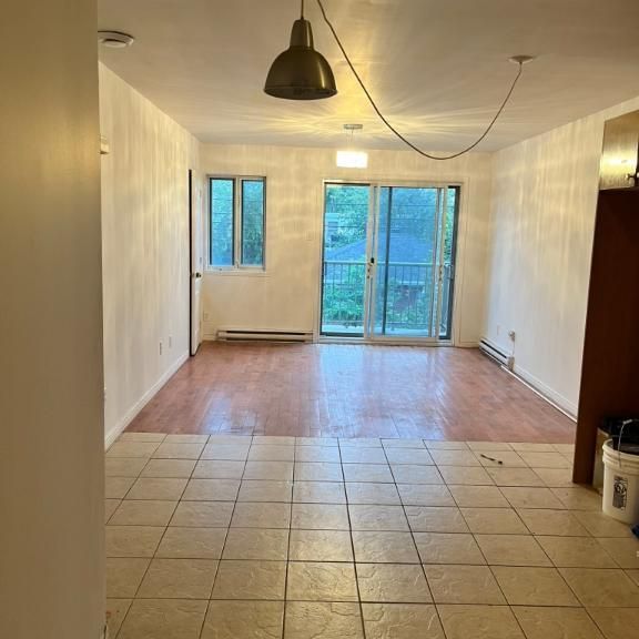 4 1/2 en haut triplex dispo mai - Photo 1