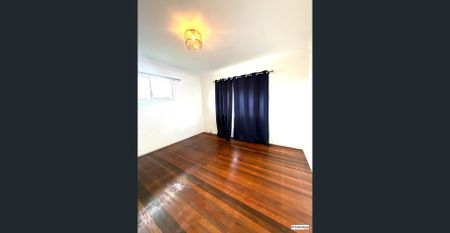 High set Home in the heart of Logan Central - Photo 5