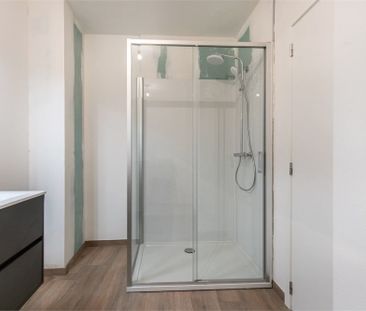 Ruim appartement met 2 slaapkamers in het centrum van Bilzen! - Photo 4