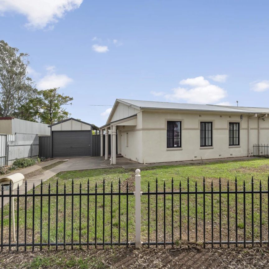 Freshly Painted Three Bedroom Home - Photo 1