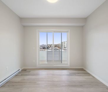 208, 360 Harvest Hills Way NE - 1 - Photo 1