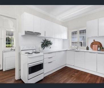 Charming Two-Bedroom Home with Timber Floors and Spacious Deck - Photo 2