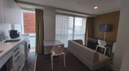 Furnished One Bedroom Apartment in the CBD, Hot & Cold Water Included. - Photo 2