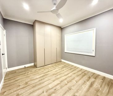 Fully Renovated Three-Bedroom Home with Carport Parking - Photo 1