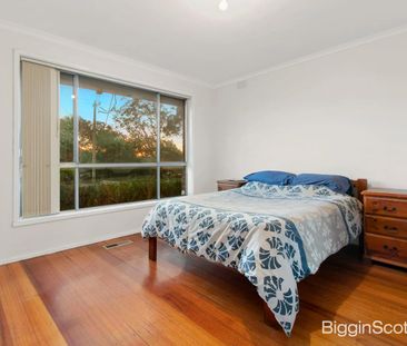 Classic Brick Home with Generous Outdoor Space for Families - Photo 6