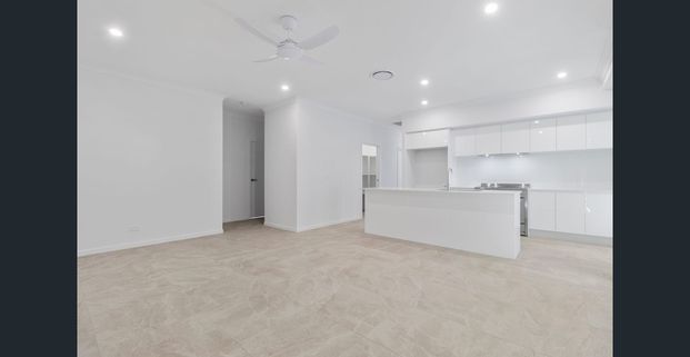 Brand New Stylish 4 Bedroom Home in Walloon! - Photo 1