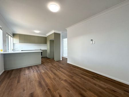 FRESHLY RENOVATED FAMILY HOME IN KIRWAN! - Photo 3
