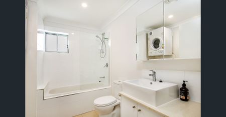 Conveniently Located - Large Two Bedroom Unit Available - Photo 4