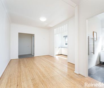 Renovated Brick Home in the Heart of Town - Photo 1