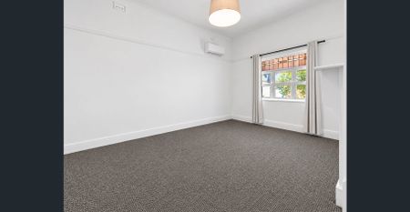 Spacious Three-Bedroom Home with Generous Backyard - Photo 5
