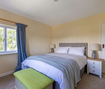 A beautifully positioned four-bedroom detached cottage set in a gor... - Photo 6