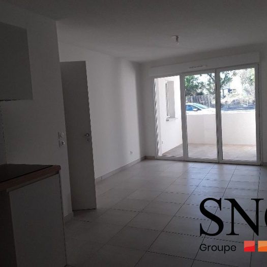 T3 AVEC TERRASSE ET DEUX PARKINGS - Photo 1