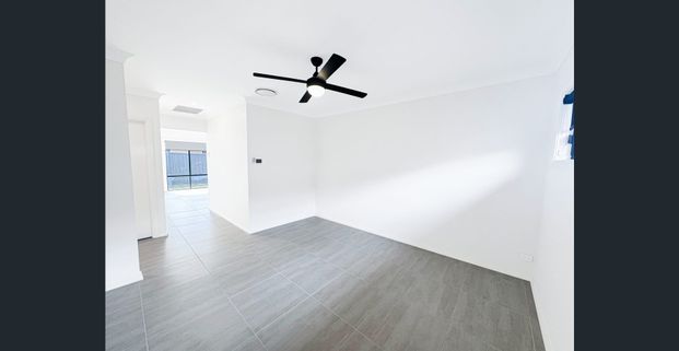 Stylish Family Home in the Heart of Aberglasslyn - Photo 1