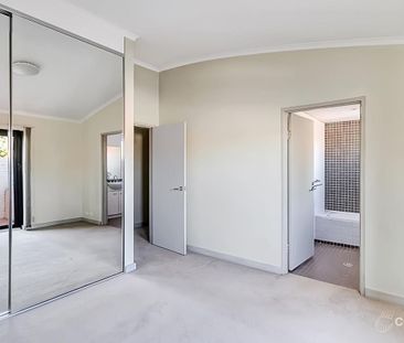Top Floor Two-Bedroom Apartment With Parking - Photo 2