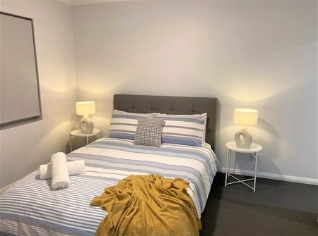 Modern 2 Bedroom Unit available soon, $750/week - Photo 5