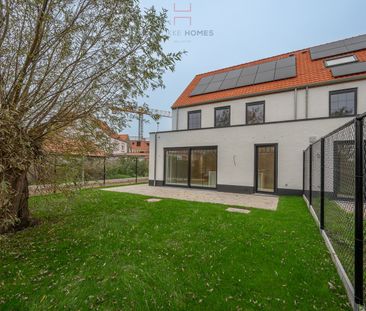 Energiezuinige nieuwbouw 3 gevelwoning met garage en tuintje. - Foto 1