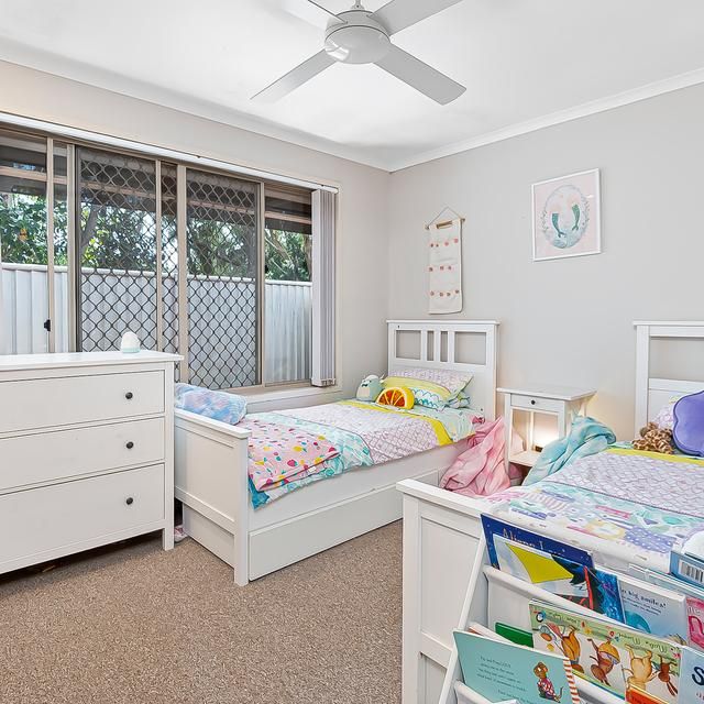 FAMILY HOME WITH POOL IN CENTRAL ROBINA - Photo 1