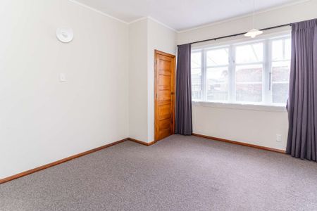 Very Tidy Three Bedroom with Sleepout - Photo 3