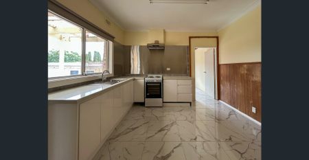 Spacious Family Living with Flexible Floorplan & Expansive Backyard - Photo 4