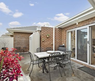 Low maintenance living in a fantastic location - Photo 1