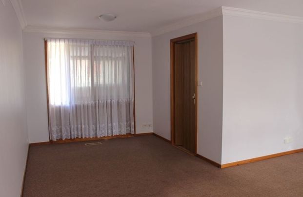 The Perfect Family Home in a Highly Sought-After Location - Photo 1